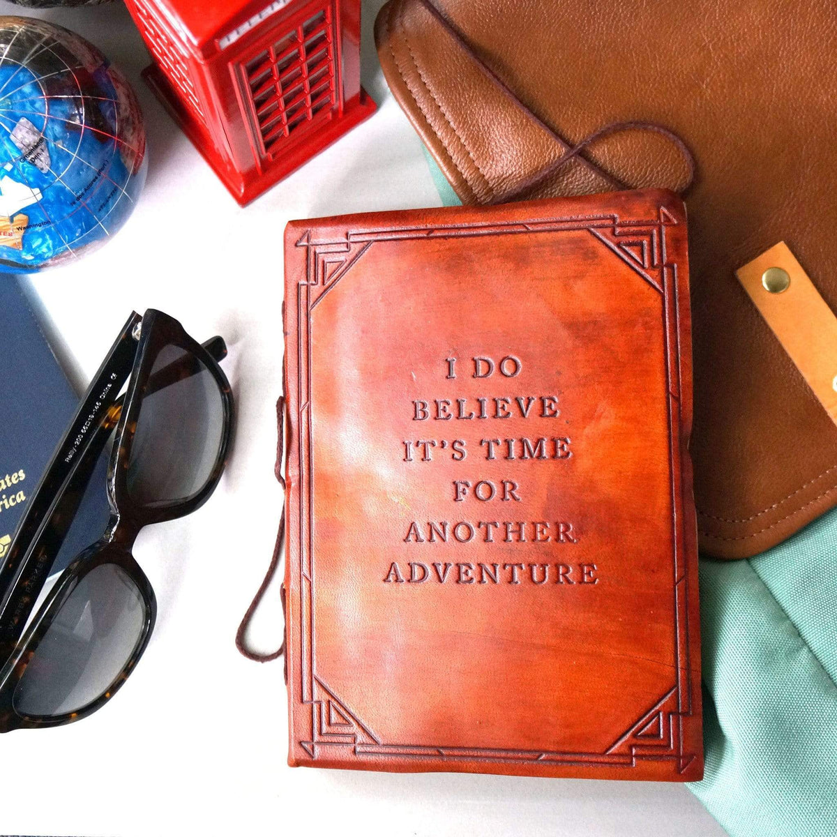 Another Adventure leather journal with debossed quote and string tie