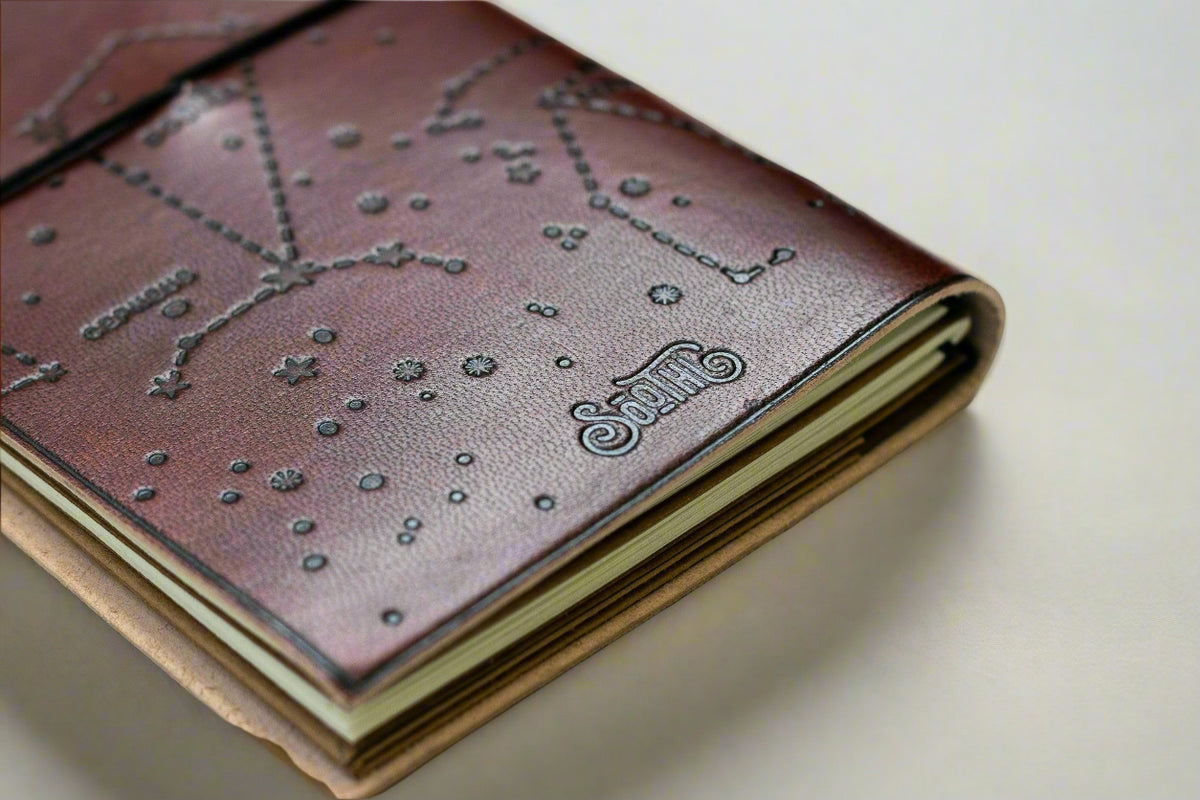 Quote Leather Travel Notebook with the Another Adventure debossed cover design, front view.