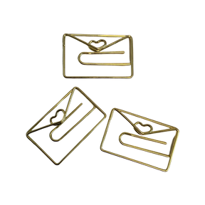 Stylish gold paper clips in unique geometric shapes – modern, functional, and perfect for adding flair to your workspace