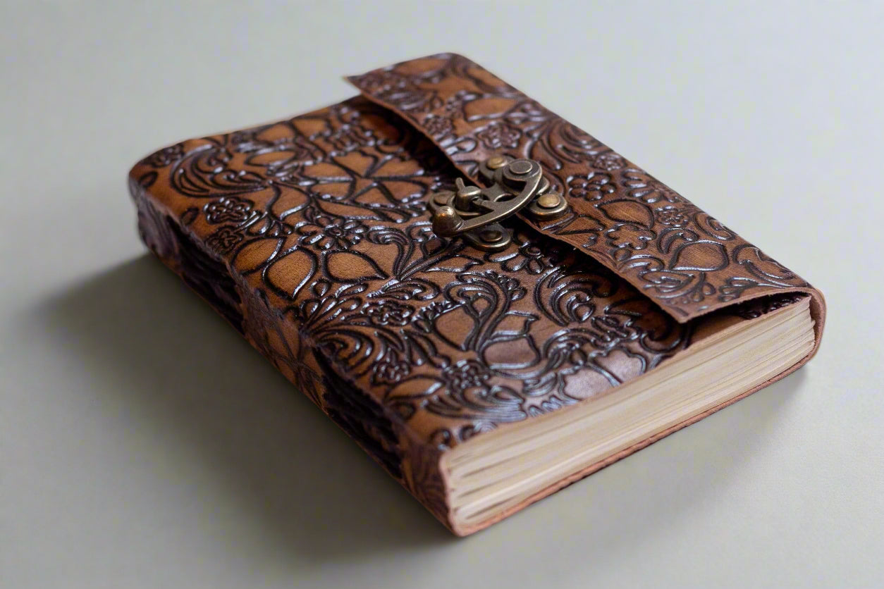 Rustic floral leather journal with latch – beautifully detailed cover for poetry, notes, and daily reflections